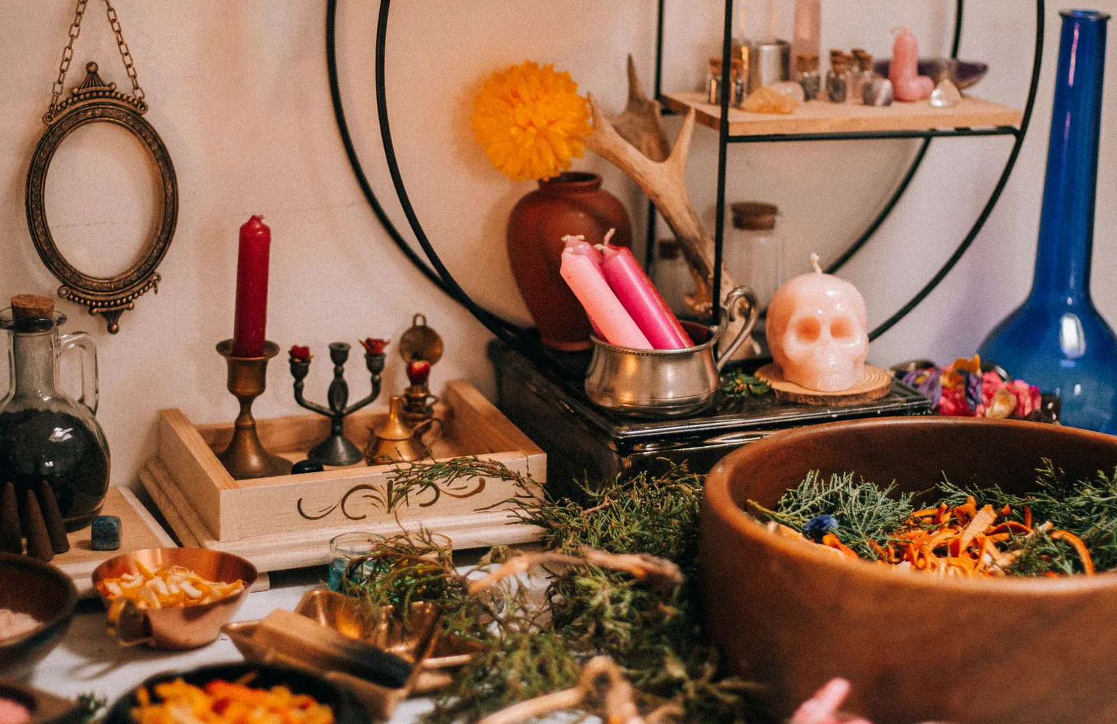 Sacred altar with candles and herbs for ceremony